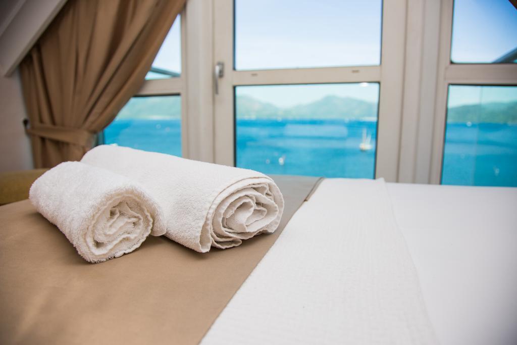 Tweepersoonskamer met 1 of 2 Bedden en Uitzicht op Zee